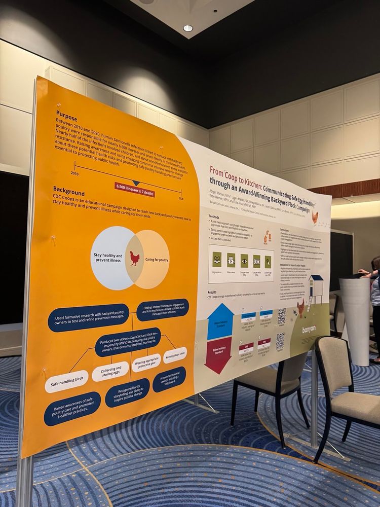 A scientific poster on display at a conference. 