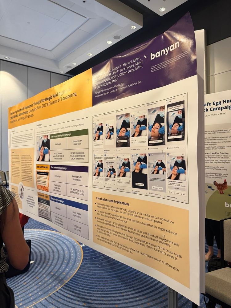 A scientific poster on display at a conference. 