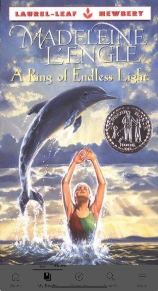 Ring of Endless Light cover, a girl and a dolphin jumping out of the ocean. 