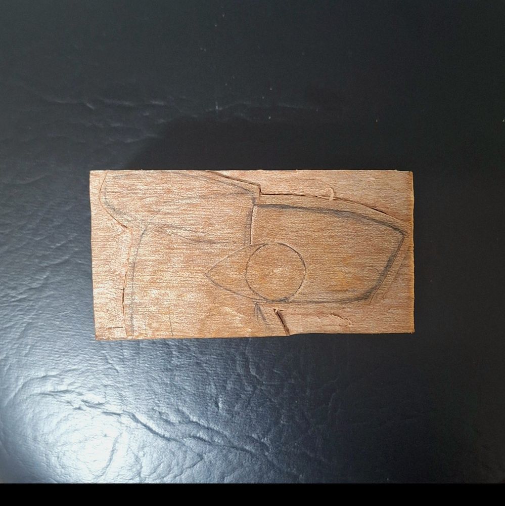 A protogens side profile drawn into a block of Queensland Maple (Flindersia Brayleyana). This wood is absolutely stunning, but I want to hide the really gorgeous grain from you, so side profile for now. It's also a lot nicer to carve than I originally thought.