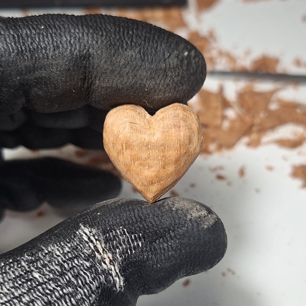 A heart shape made from wood 