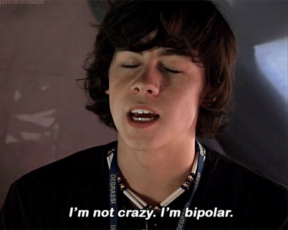 a young man says i 'm not crazy i 'm bipolar while wearing a degrassi lanyard around his neck