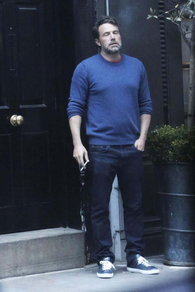 Ben Affleck feeling the weight of existence whilst smoking a cigarette