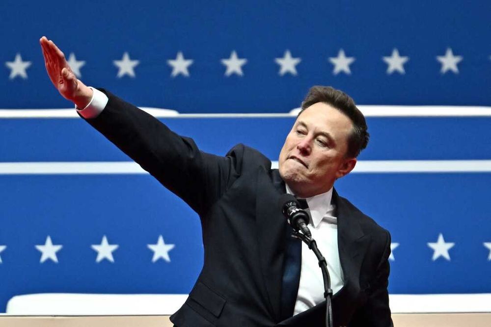 Musk doing a Heil Hitler gesture.
