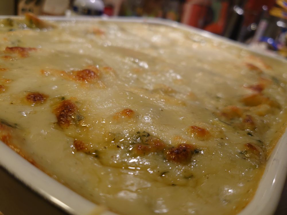 A macro shot of a Mac'n cheese bake straight out the oven 