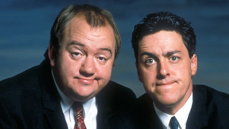 Picture of British comedy duo Smith and Jones. Mel Smith is on the left, Griff Rhys Jones is on the right.