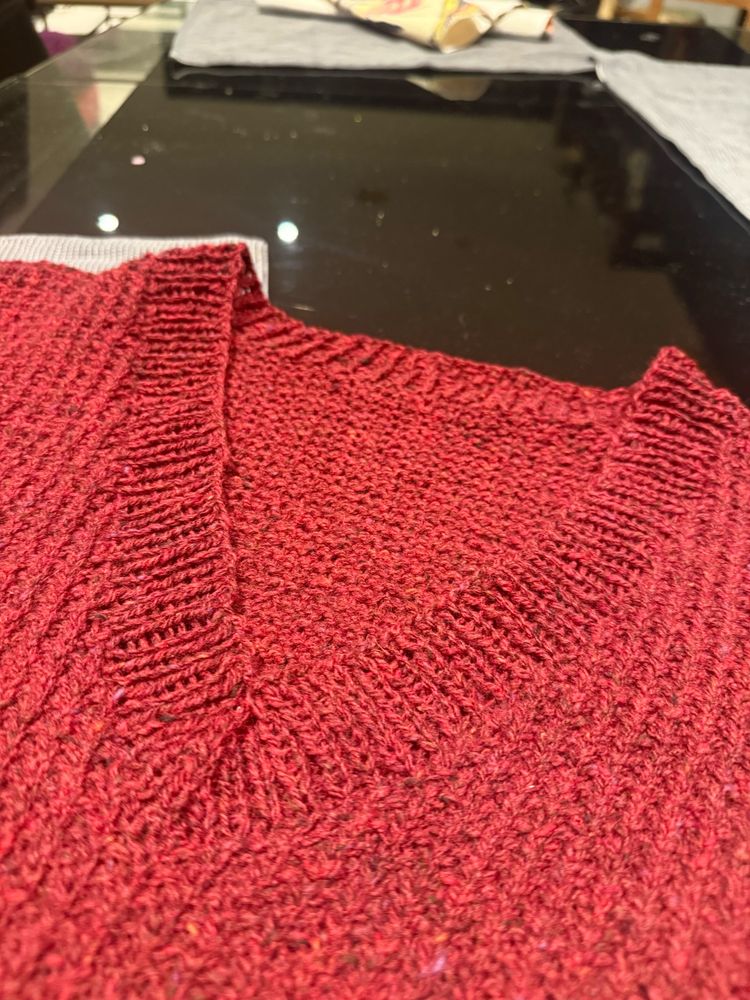 The collar section of the Gandy jumper. I had no idea how one would knit a v-neck but it’s come out rather tidy and looking good. Maybe should have gone down a needle size