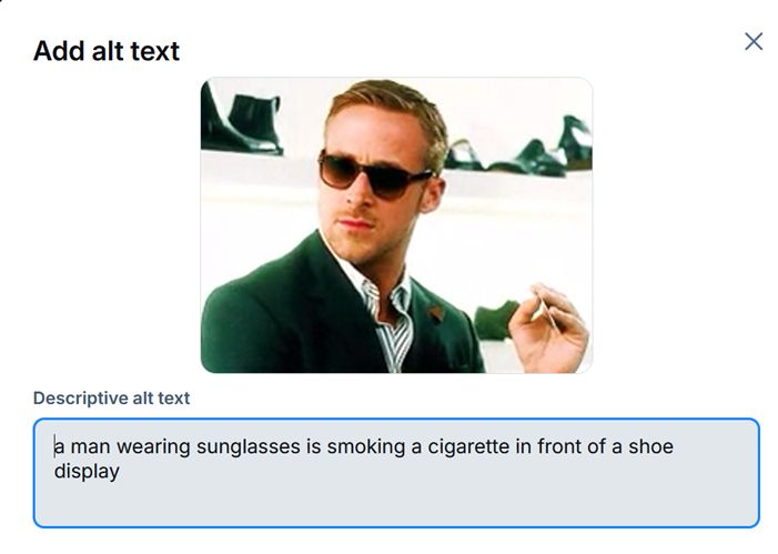 A screenshot of the alt text of a gif showing Ryan Gosling looking affronted. The alt text reads, "a man wearing sunglasses is smoking a cigarette in front of a shoe display".