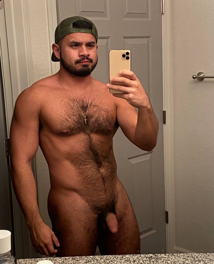 Latino man shows off his muscular body and dick. 

