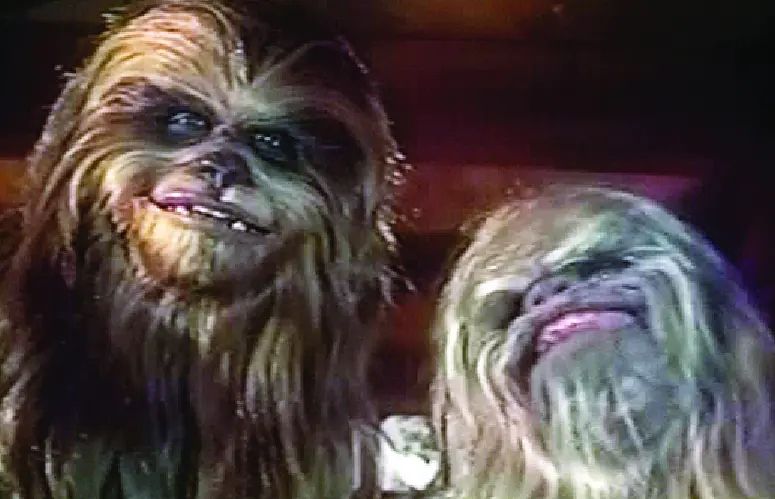 Photo from “The Star Wars Holiday Special” (1978): A close up of two Wookiees, Chewbacca’s wife, Malla, and his disgusting Father Itchy, give terrifying smiles..