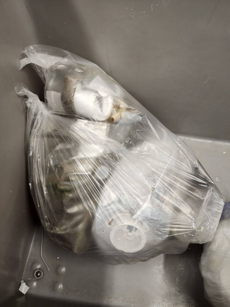 A bag of garbage, no idea how much it weighed but it's about 3 Walmart bags full if you can picture that.