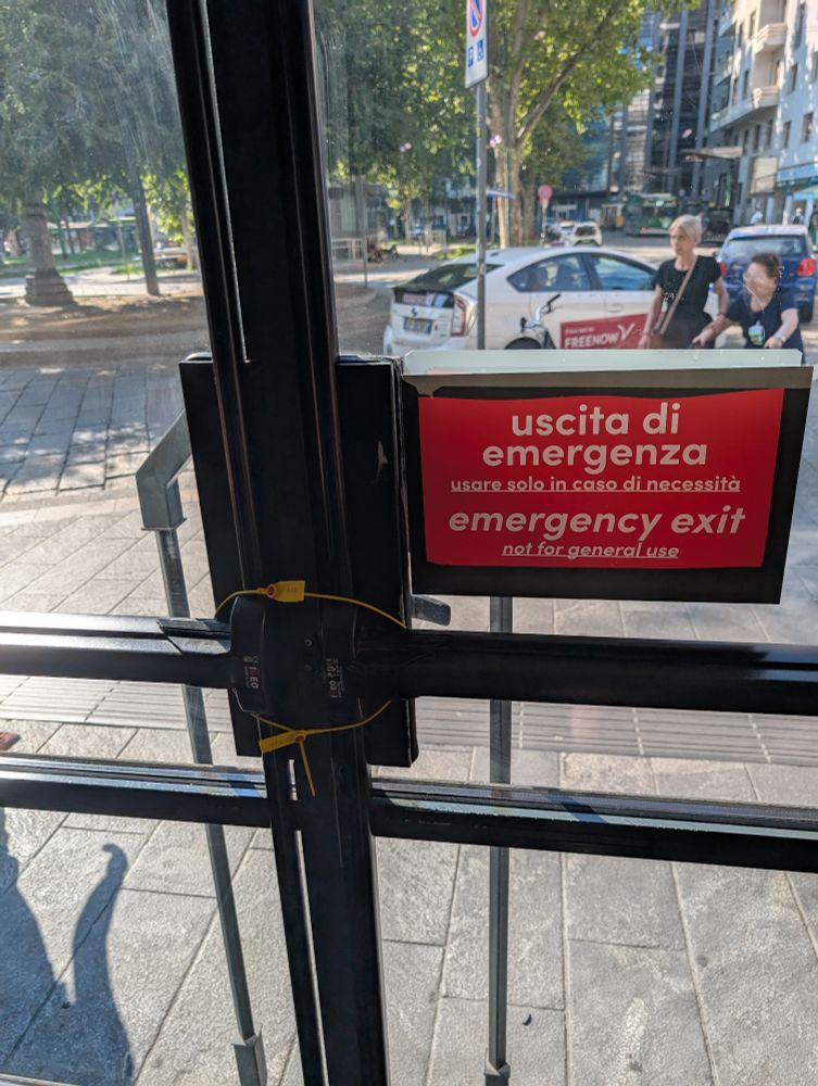 An emergency exit that's artificially locked by the owners of a bar (so it's not usable)