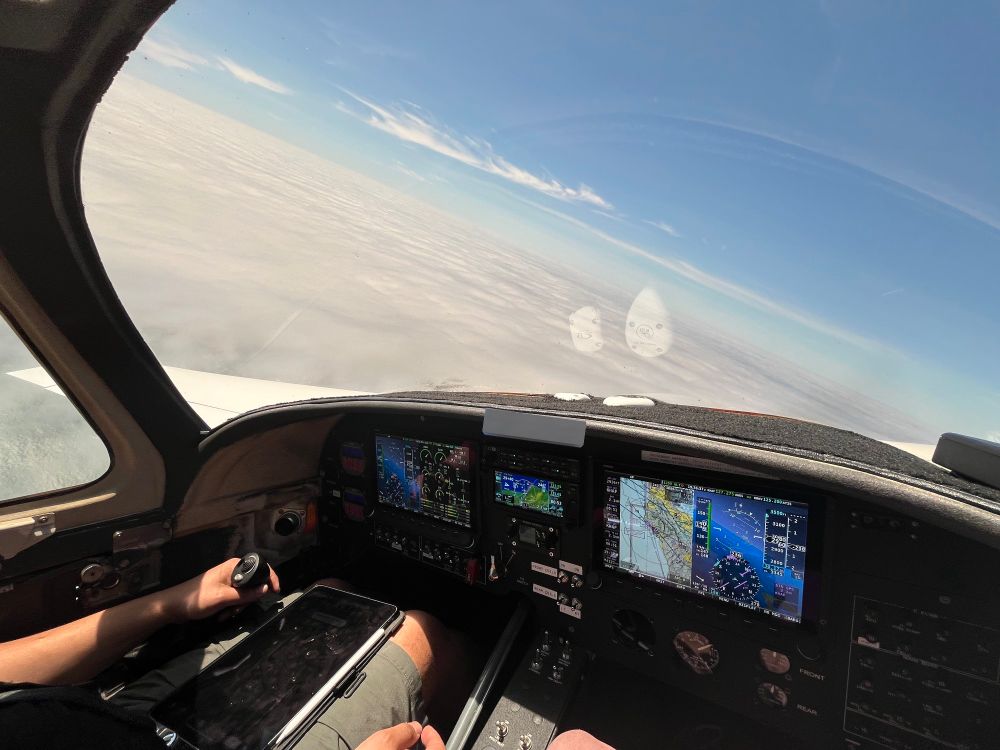maneuvering over the clouds wondering if we could really make it into HAF. reported weather was overcast at 300 feet, approach only gets us to 361 feet...