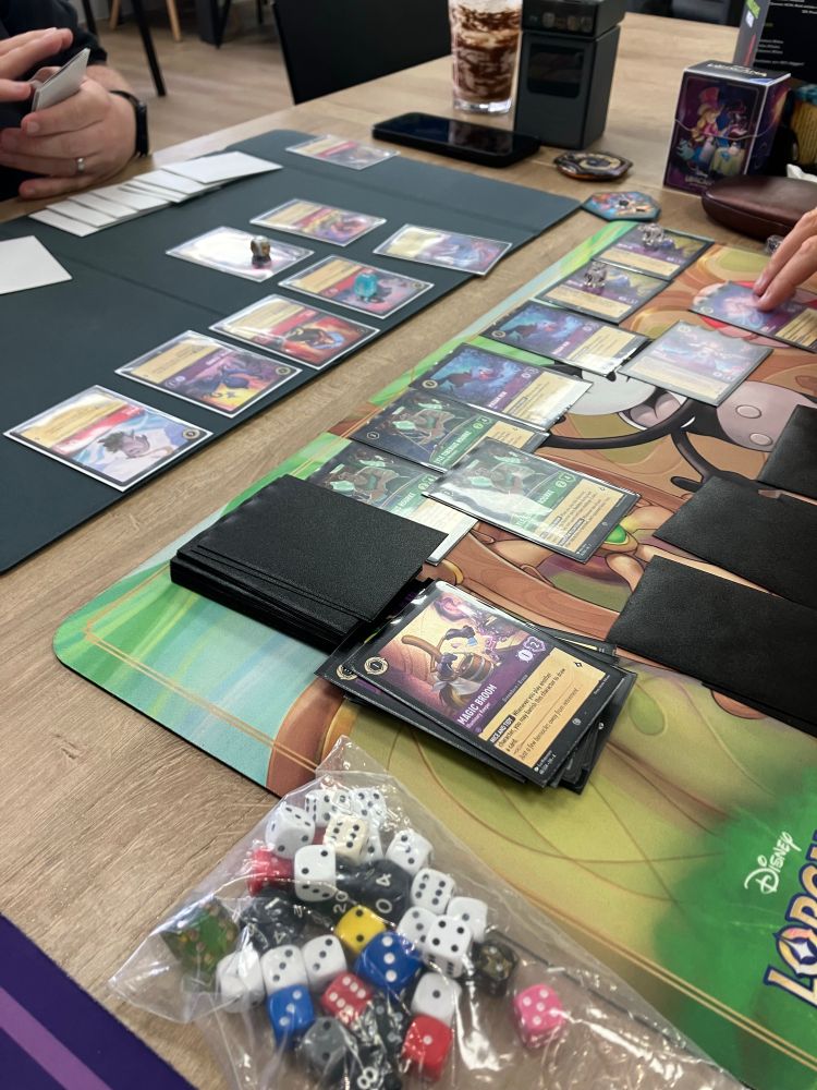 Complicated lorcanna deck of purple green midrange vs purple red midrange 