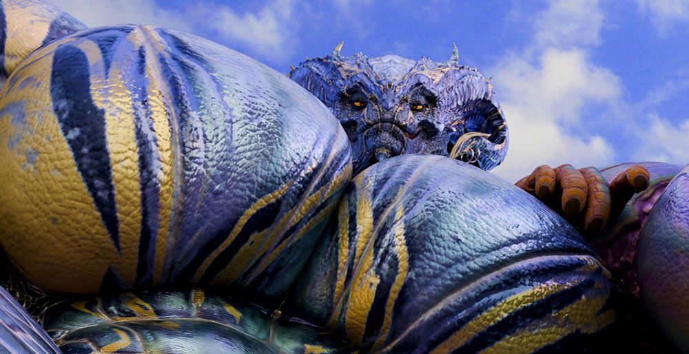 A massive dragonborn looking down over his pecs at the viewer.