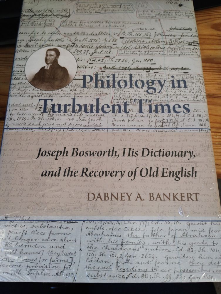 The front cover of a book, titled "Philology in Turbulent Times: Joseph Bosworth, His Dictionary, and the Recovery of Old English", by Dabney A. Bankert.