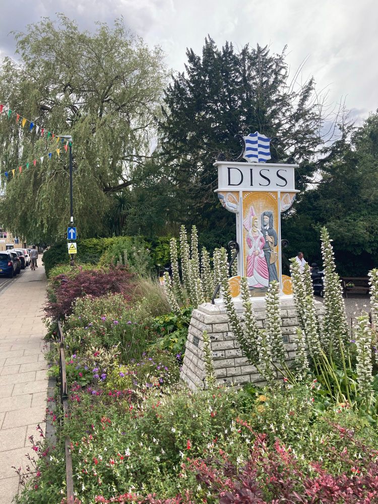 Stone sign for the Norfolk town of Diss - birthplace of the Diss track