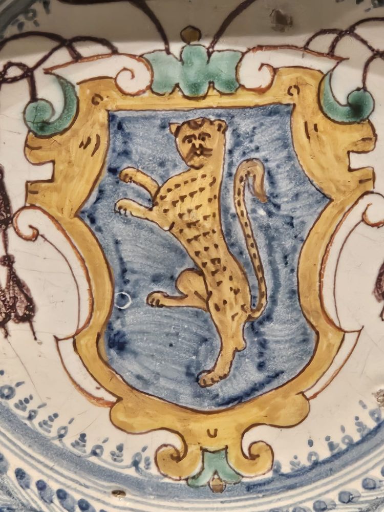 painted ceramic plate with a very goofy leopard 