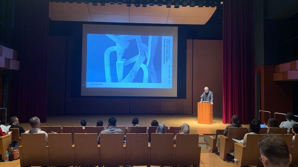 Opening remarks by Prof. Michael Emmerich. Ono Memorial Auditorium, Waseda University.