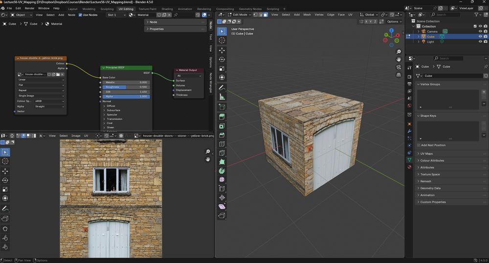 Screenshot of Blender showing a cube with a basic image UV mapped to it