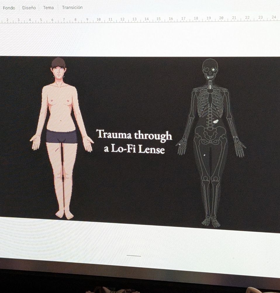A slide for a talk, you can see, in pixelart, a naked person and the x-ray counterpart. It reads "Trauma through a Lo-Fi Lense"