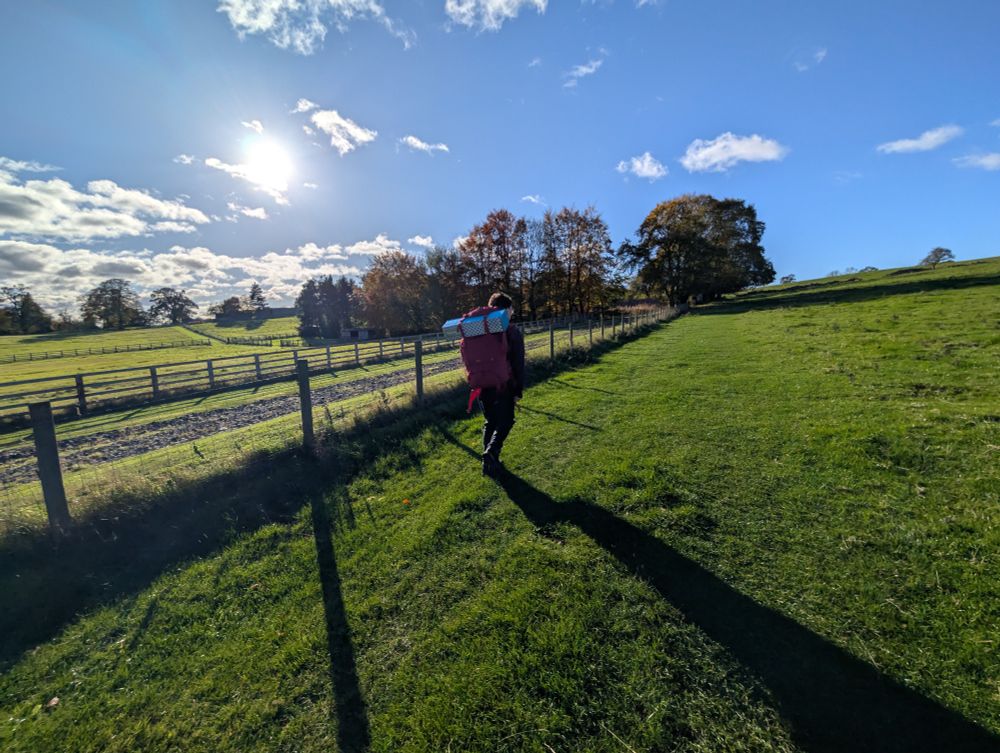 HIking through rural Northumberland in autumnal / wintery sun in the sky.