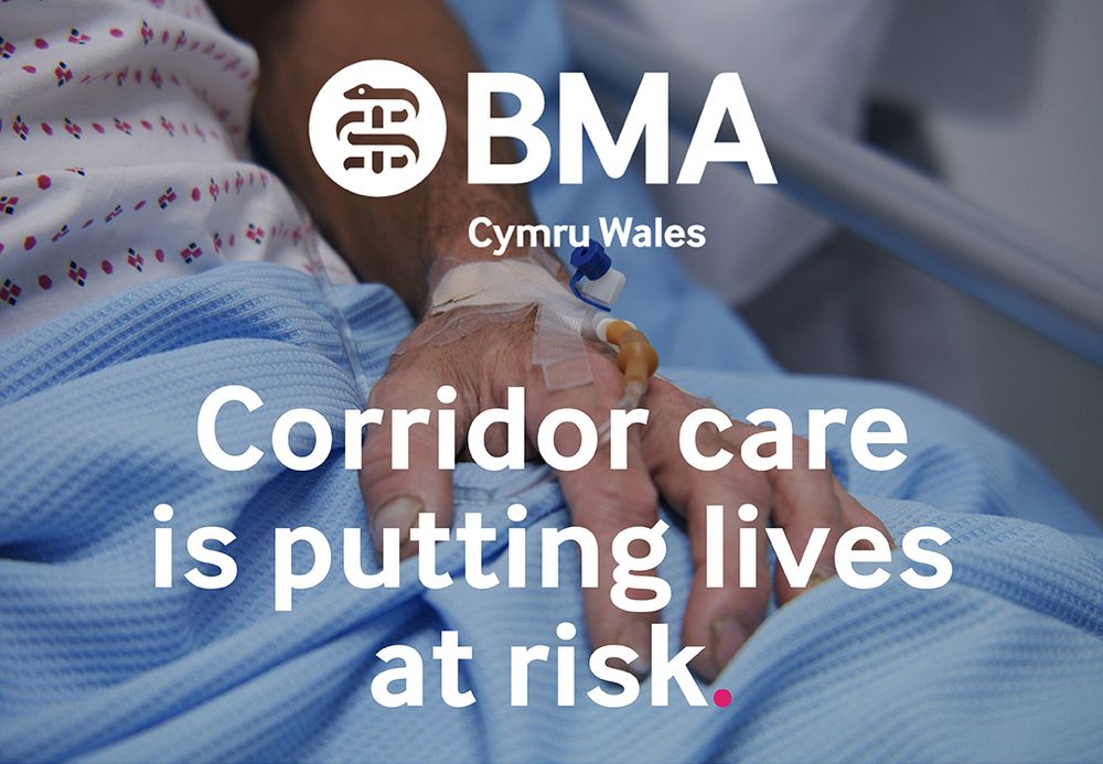 Photo of a hand with a drip resting on hospital blankets with the BMA Cymru Wales logo and the text Corridor care is putting lives at risk.