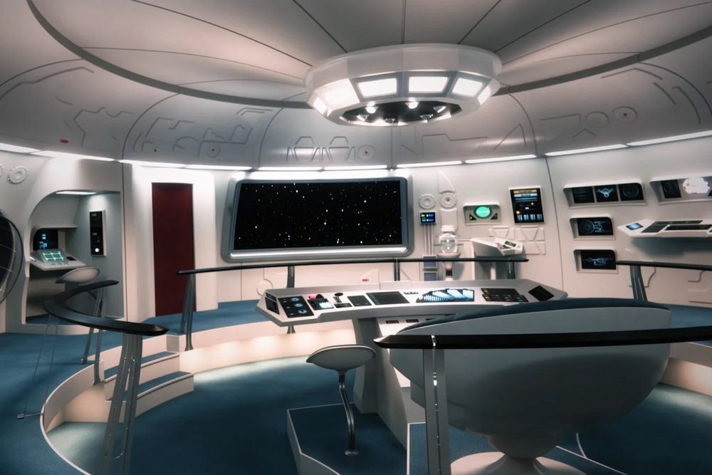 Bridge of the Enterprise made for a 70s reboot of Star Trek that never happened. Cool colors, soft lighting, and curvilinear forms with echos of both the original bridge and what was to come.