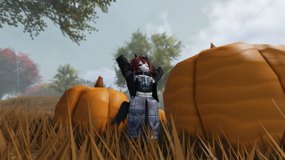 ORii's ROBLOX avatar stretching amongst large pumpkins in the woods.