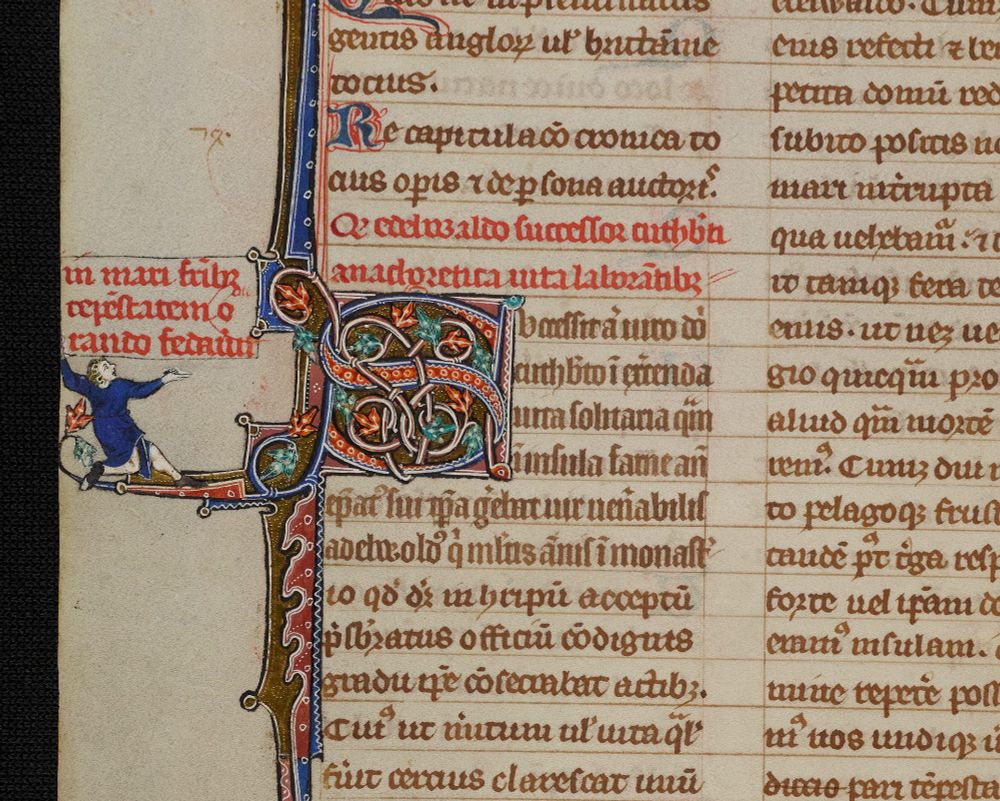 Page of a medieval manuscript showing a comical illustration of a man in the margin depicted holding up the annotation above him.