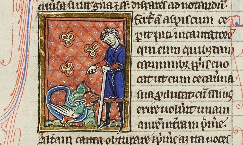 A close-up of a medieval bestiary, featuring a framed man pointing down to a small dragon at his feet.