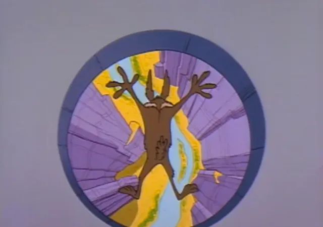 Image d'un dessin animé Looney Tunes où Coyote est tombé dans un trou et est en train de chuter visiblement vers le fonds d'un canyon.