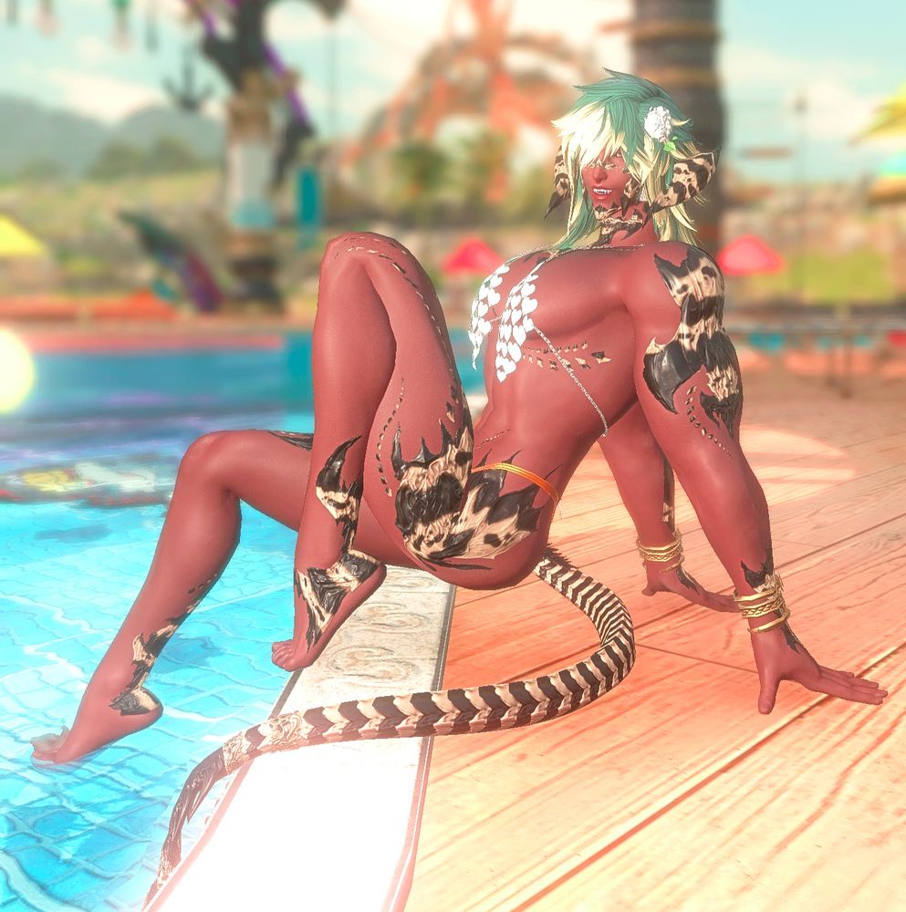 Cei posing in a heart-top bikini and golden bikini bottoms by the moonfire pool