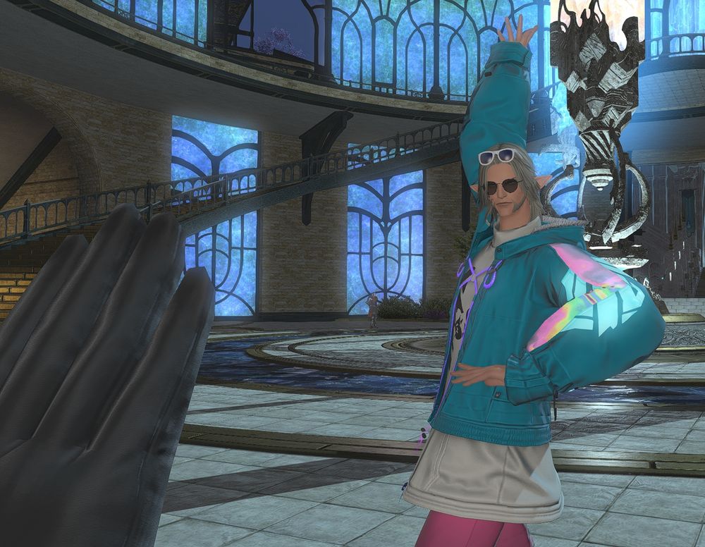 Urianger poses as a hand is raised in either agreement or defense of the self. Who is to say, truly...??