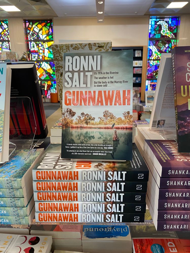 Photograph of Ronni Salt’s debut novel stacked up with the new releases at the NLA Bookshop in Canberra.