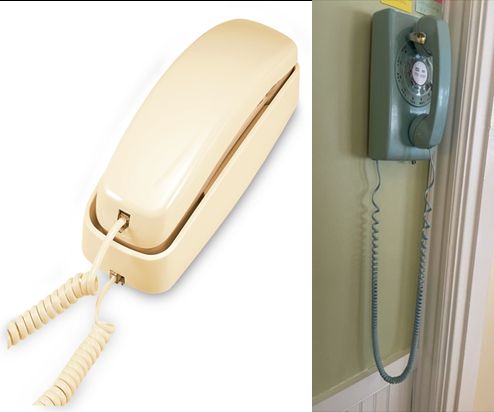 On left - beige trimline phone. On right - wall phone with dial and long twisty cord.