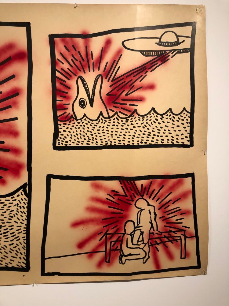 Detail from a keith haring painting. 2 comic-like panels. Top, a UFO zaps a beam on a dolphin popping out of water. Bottom, the beam hits two figures on a bench, one is kneeling, sucking the other one’s dick.