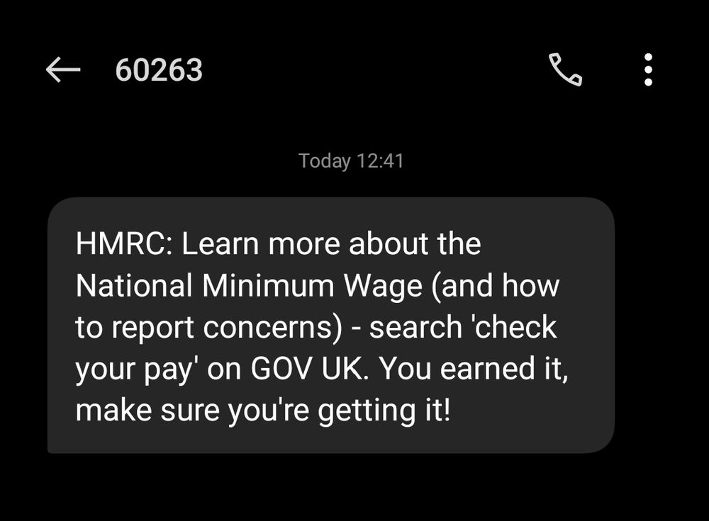 Message from the UK government saying to report if I have concerns about minimum wage.