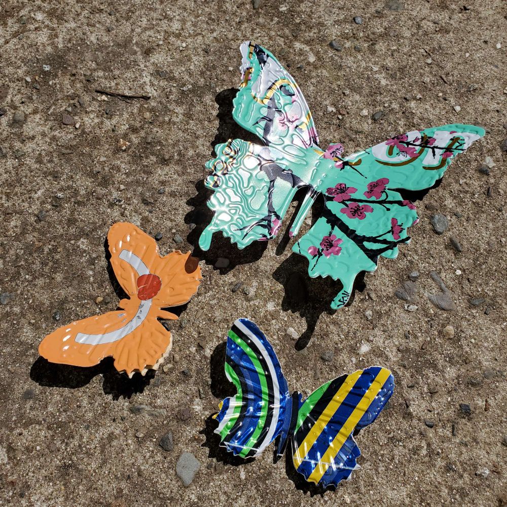 3 aluminum can #butterfly magnets on concrete #whimsy