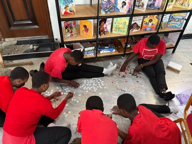 Students working together on a puzzle