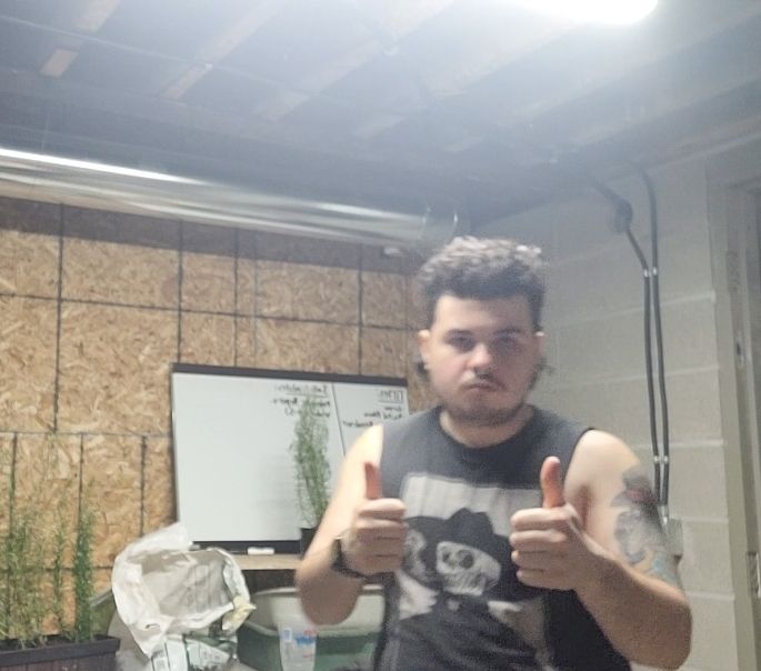 The super cool and awesome artist/gardener in charge of getting New Eden Relay growing to its fullest potential. Witness this fine specimen giving the double thumbs up after repotting 4 rosemary plants. Amazing.