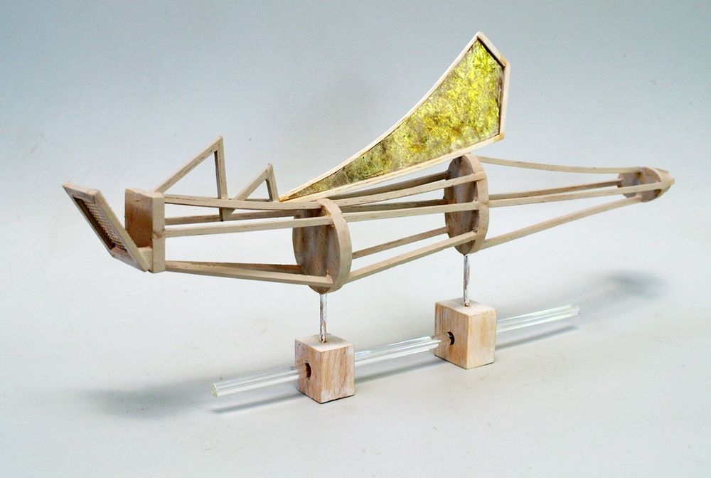 Kreiter sculpture: Time machine #2
Sculpture made of balsa wood, natural mica, and glass rod. Approximately 9 inches tall. 