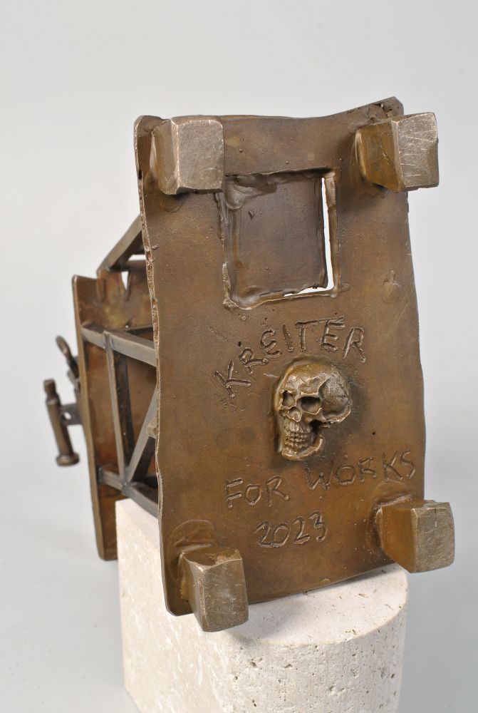 Detail from the bottom of the sculpture with a skull and the destination for the sculpture which was The Works Gallery, San Jose, Ca