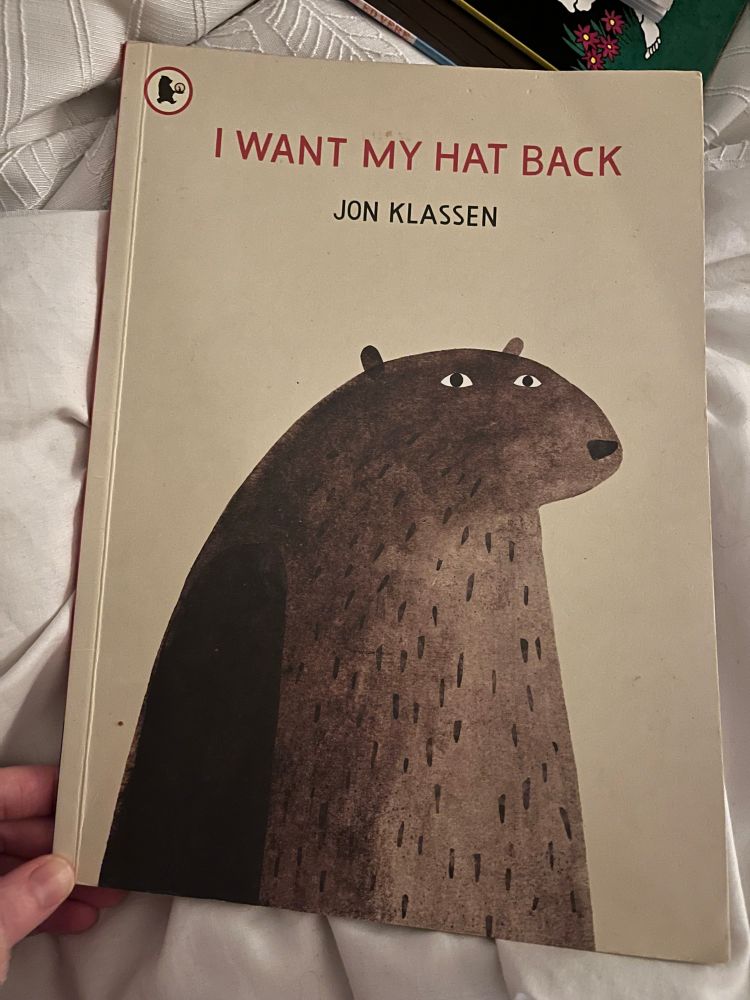 A paperback copy of the children’s book I Want My Hat Back by Jon Klassen