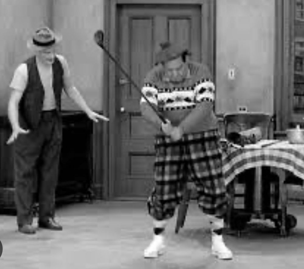Ed Norton teaches Ralph Kramden golf. 