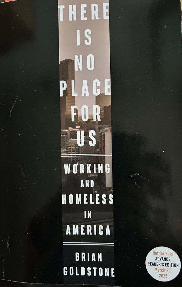 Book title: There is No Place For Us: Working and Homelessness in America Brian Goldstone.  Black cover with text in middle over photo of downtown Atlanta