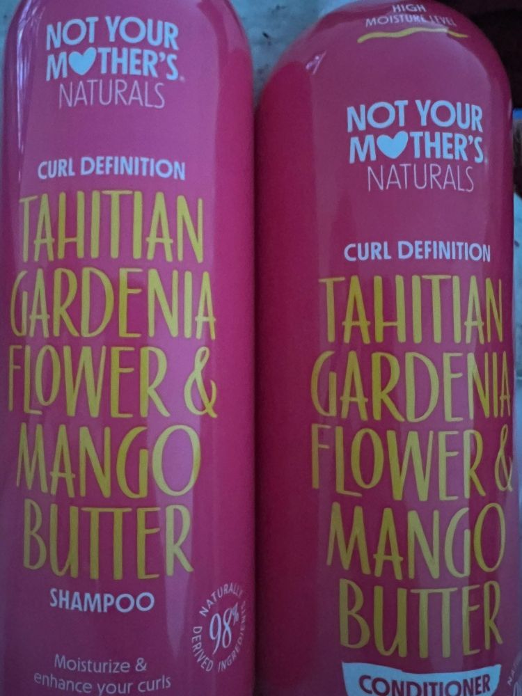 Photo of a bottle of shampoo and conditioner from the organic hair care brand Not Your Mother's Naturals. The bottles are not heavy.
