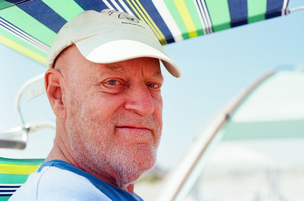 An elderly man at the beach