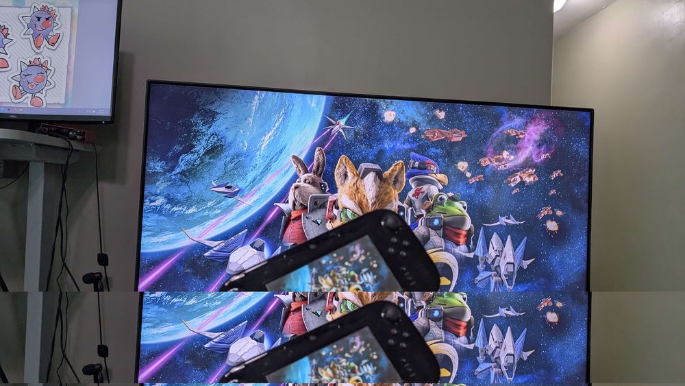 photo of star fox zero played on a big screen tv