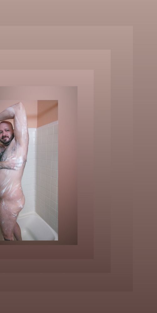 A 260-pound, ruggedly handsome man lathers himself up in a motel shower.  Preparation for a fuckfest with five burly guys while on a road trip to Michigan. 1